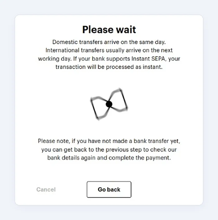 Paybis Please wait screen shown while the payment is being processed